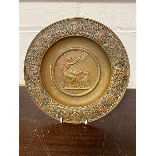 89 - A 19th century continental cast dish, cast with a classical scene -