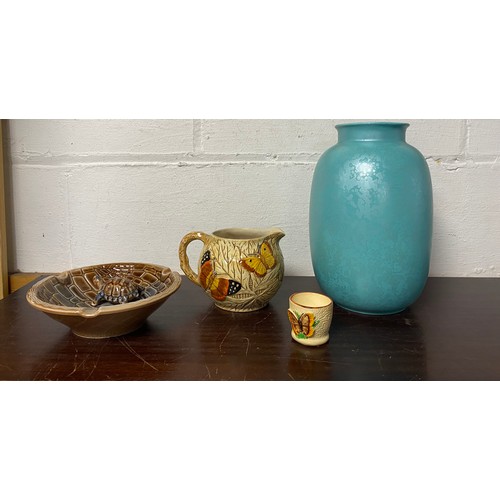 128 - A turquoise glazed Poole Pottery vase and other china including Wade ashtray -