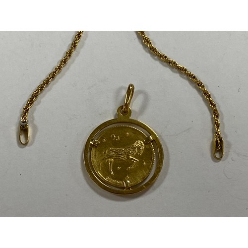 6 - A continental 18ct gold pendant on chain (lacking clasp) -