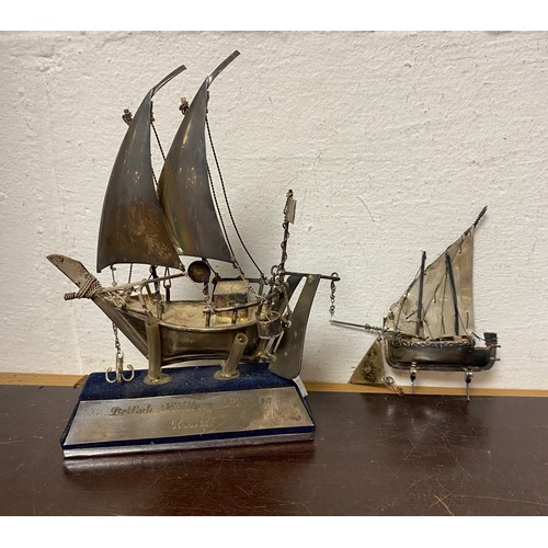 29 - A Kuwaiti silver model of a sail boat, on stand and another boat -