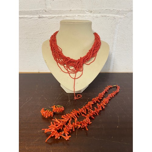 36 - A multi-row coral bead necklace, together with a dog tooth coral necklace and earring set -