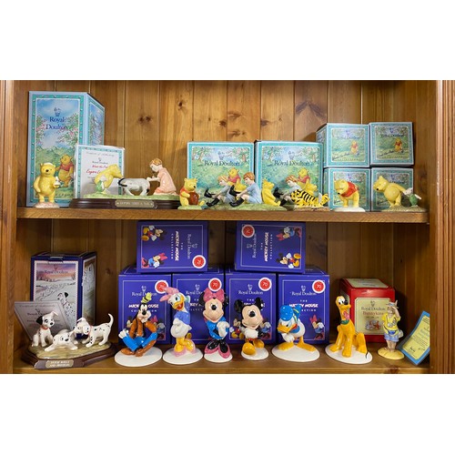 135 - A group of nine Royal Doulton Winnie The Pooh figures, including limited edtion 'Eeyore Loses A Tail... 