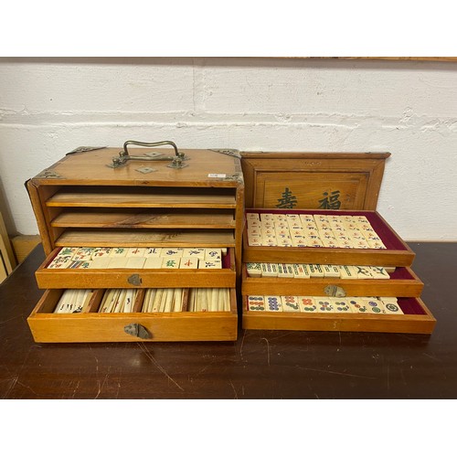 225 - A 20th century mah-jong set, in brass mounted case, the bone and bamboo tiles in file drawers -