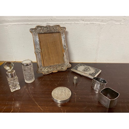 57 - A small quantity of silver items, various dates and makers, including silver faced frame (a/f), two ... 