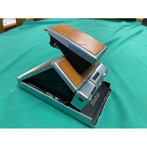 234 - A Polaroid SX-70 land camera -