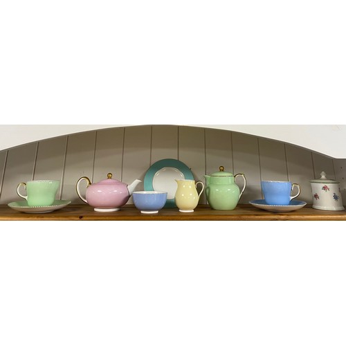 152 - A Wedgwood breakfast set, comprising vari-coloured teapot, water jug, pair cups and saucers, milk ju... 