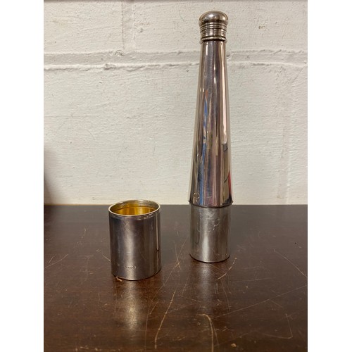 79 - A Victorian silver hunting flask, date letter rubbed, in the form of a bottle and cover, with cup -