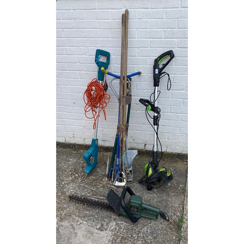 396 - An electric strimmer, electric weeder and hedge cutter and a quantity of garden tools -