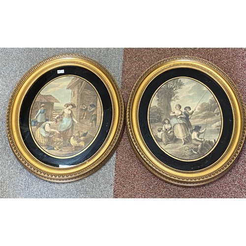 165 - A pair of 19th century stipple engravings, in oval verre eglomise frames -