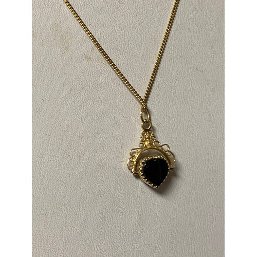 3 - A 9ct gold chain suspending a heart shaped bloodstone swivel fob -