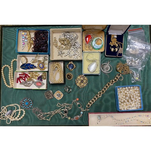 19 - A rolled gold hinged bangle and another panelled rolled gold bangle, silver charm bracelet and other... 