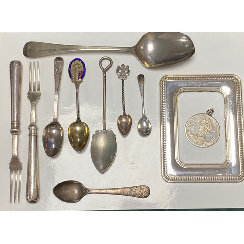 33 - A matched three piece silver cruet, various dates, together with assorted silver spoons, silver fram... 