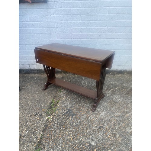 367 - A small drop leaf lyre end coffee table -