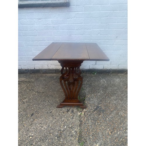 367 - A small drop leaf lyre end coffee table -