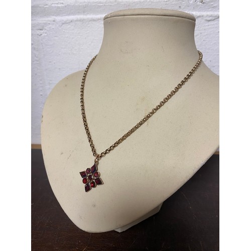 3 - A Georgian garnet flatback pendant, of lozenge design, to 9ct gold chain -
