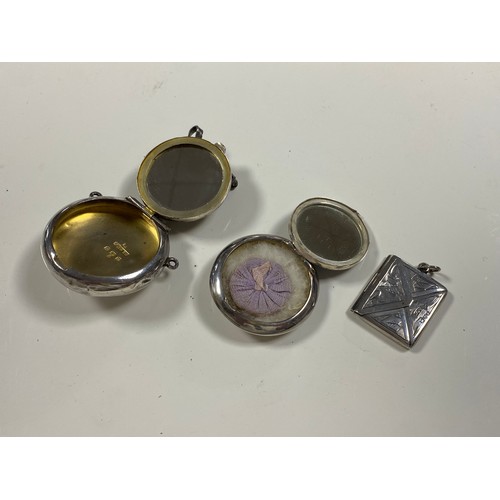 8 - A George V silver and enamel compact pendant, Birmingham 1912, with white and  burgundy guilloche co... 