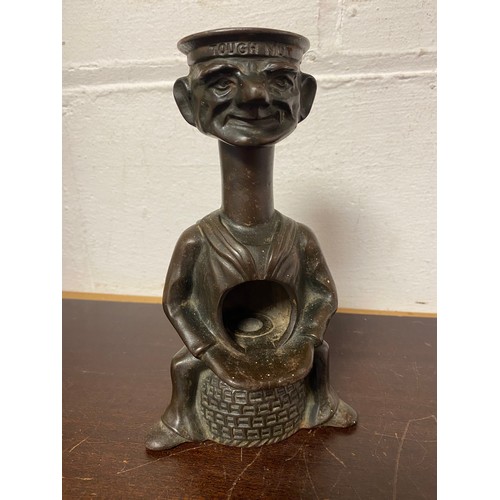 A cast iron 'Toughnut' Nut Cracker, in the form of a sailor upon a lobster pot, patent 29795 -