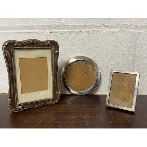 1 - A group of three silver photograph frames, various dates and makers -