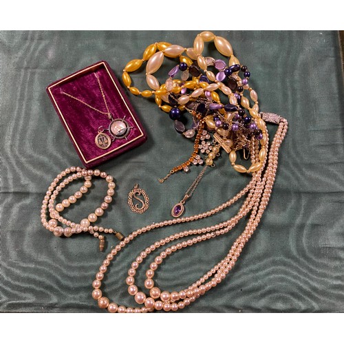 14 - A gold mounted amethyst pendant, a plated on silver intaglio pendant on chain, and a quantity of cos... 