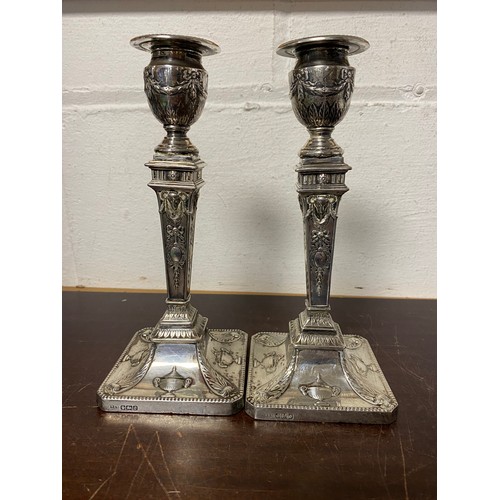 49 - A pair of neo-classical style silver candlesticks, Sheffield 1906 -