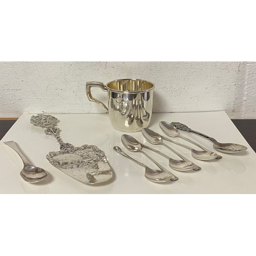 83 - A small group of silver items, including modern christening cup and set of six teaspoons and a conti... 