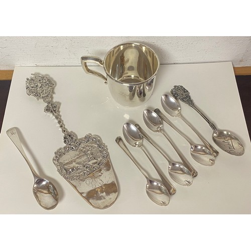 83 - A small group of silver items, including modern christening cup and set of six teaspoons and a conti... 