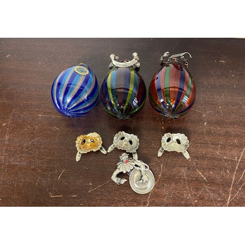 7 - A group of three silver mounted Murano glass clowns, each depicting a chef, together with a bottle s... 