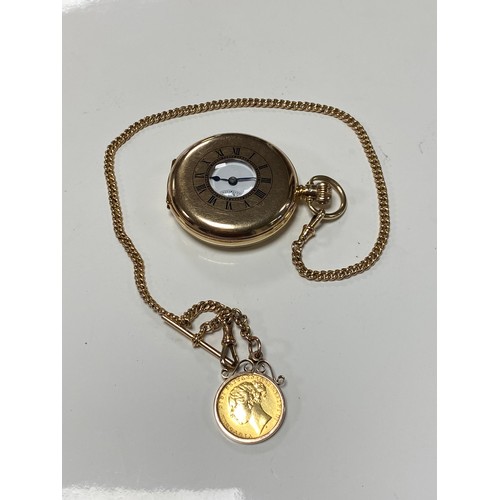 103 - A 9ct gold cased half hunter pocket watch to a 9ct watch chain suspending a 'T' bar and a Queen Vict... 