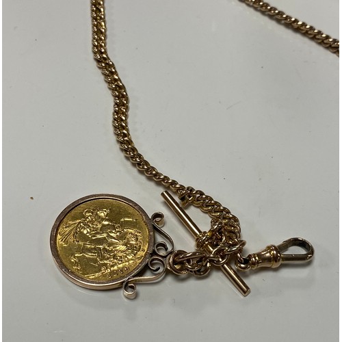 103 - A 9ct gold cased half hunter pocket watch to a 9ct watch chain suspending a 'T' bar and a Queen Vict... 