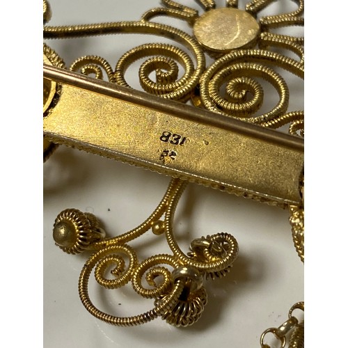 47 - An Scandinavian silver solje, 830 standard, the bar in filigree and with roundel decoration suspendi... 