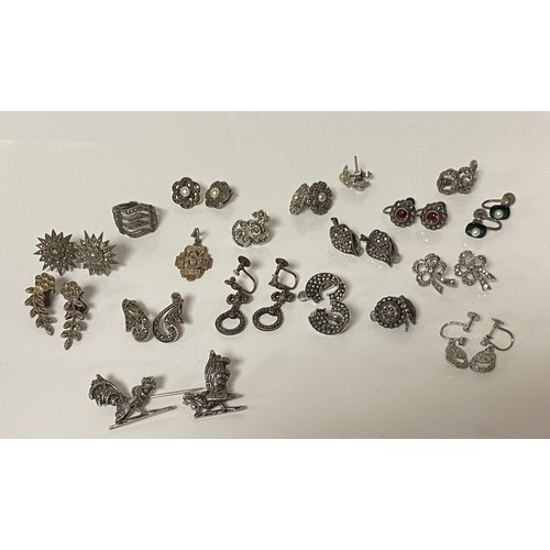 52 - A quantity of silver mounted marcasite jewellery, to include rings necklace, bracelet, brooches, and... 
