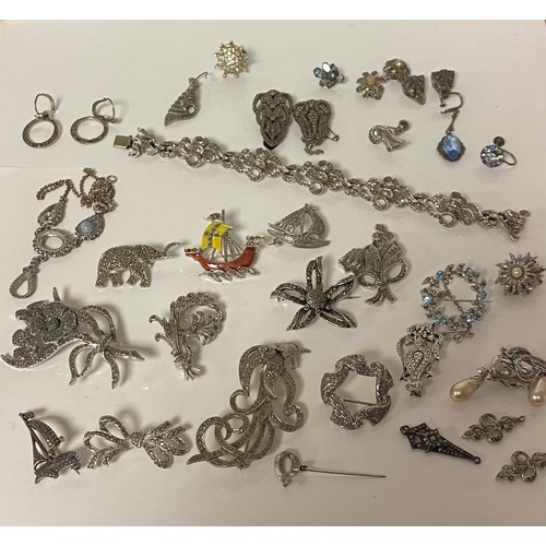 52 - A quantity of silver mounted marcasite jewellery, to include rings necklace, bracelet, brooches, and... 