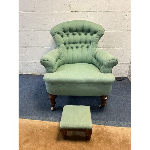 A 19th century button back chair, on short turned legs, with stool -