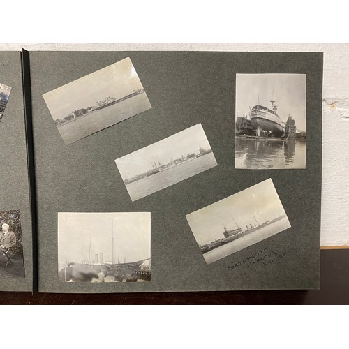 202 - A 1920s photograph album, including titled and annotated views including Dorset , Stonehenge, Snowdo... 