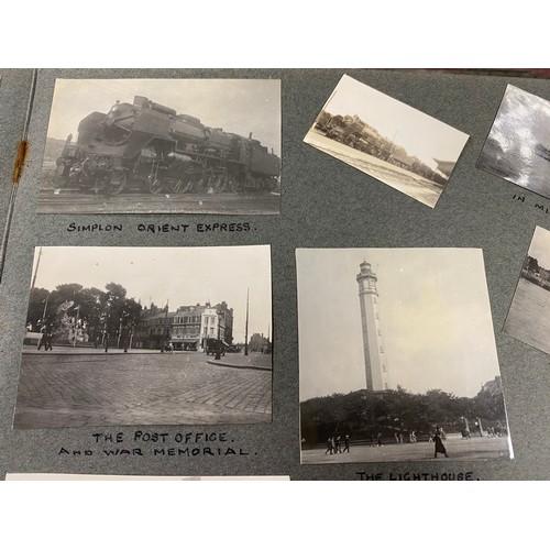 202 - A 1920s photograph album, including titled and annotated views including Dorset , Stonehenge, Snowdo... 