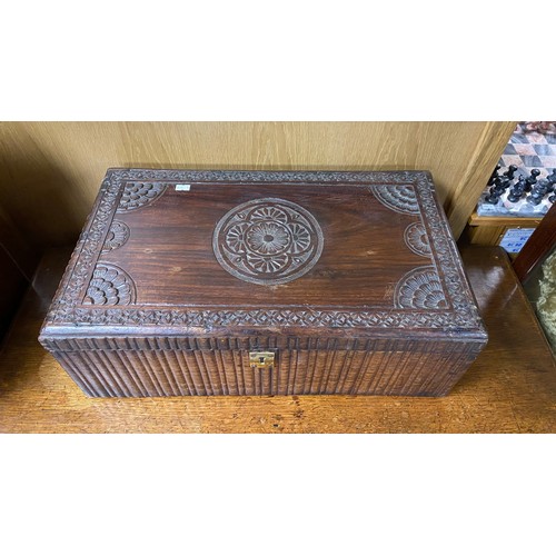 88 - A heavily carved eastern hardwood box -