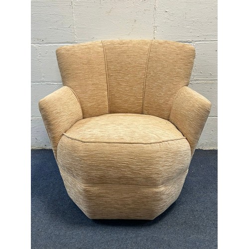 337 - A low armchair, with fan back -