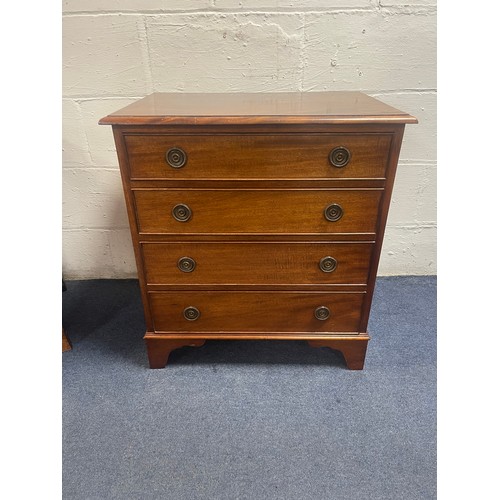 338 - A Georgian style mahogany chest of drawers, fitted with four long drawers, on bracket feet -