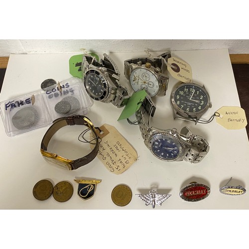 2 - An Omega wristwatch, other watches, replica coins, badges, etc -