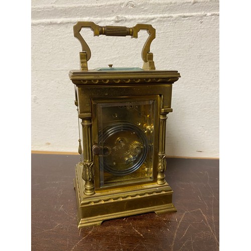 345 - A French brass cased carriage clock, with repeater -