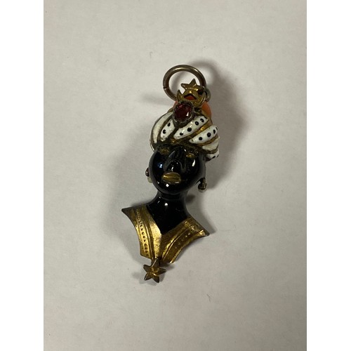 14 - A 19th century enamel and gem set blackamoor pendant -