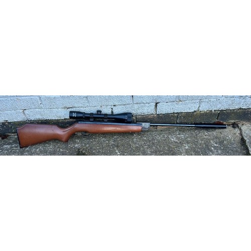 444 - A Webley and Scott Excell .22 air rifle with suppressor, fitted with a Zieler 4 x 40 wide angle scop... 