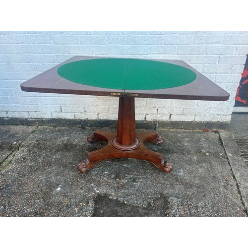 350 - A 19th Century mahogany folding card table, with centre frieze, central column, quatrefoil base and ... 