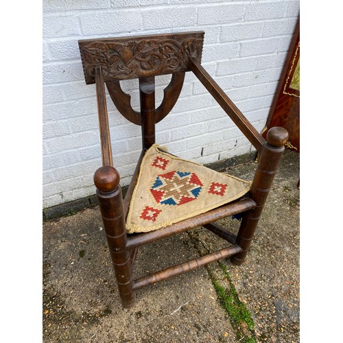 363 - A 19th Century carved oak Warwick/turners chair, with carved back, triangular seat and circular supp... 