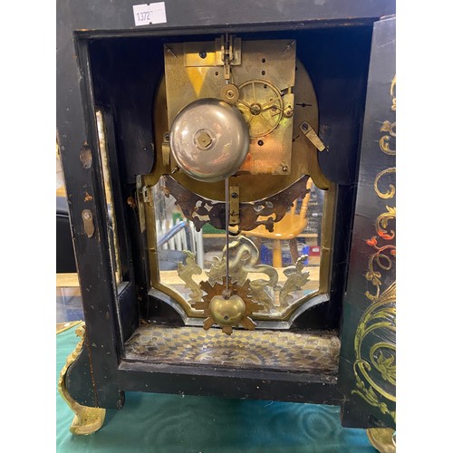 367 - A French Louis XVI style boulle ware bracket clock, surmounted by a figure with a torch, signed Coig... 