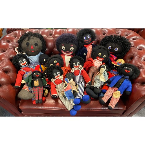 266 - A group of Golly dolls -