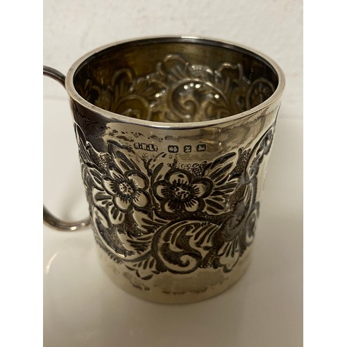 46 - A Victorian silver christening mug, together with a spoon and fork by different makers -