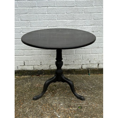 380 - A 19th Century snap top table, with circular top on a central column  -