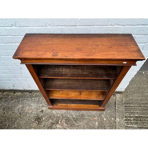 388 - A 19th Century open bookcase, with three shelves -