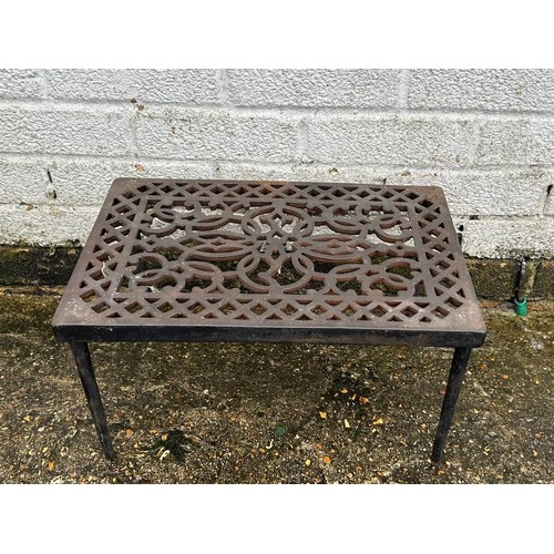 395 - A cast iron trivet -